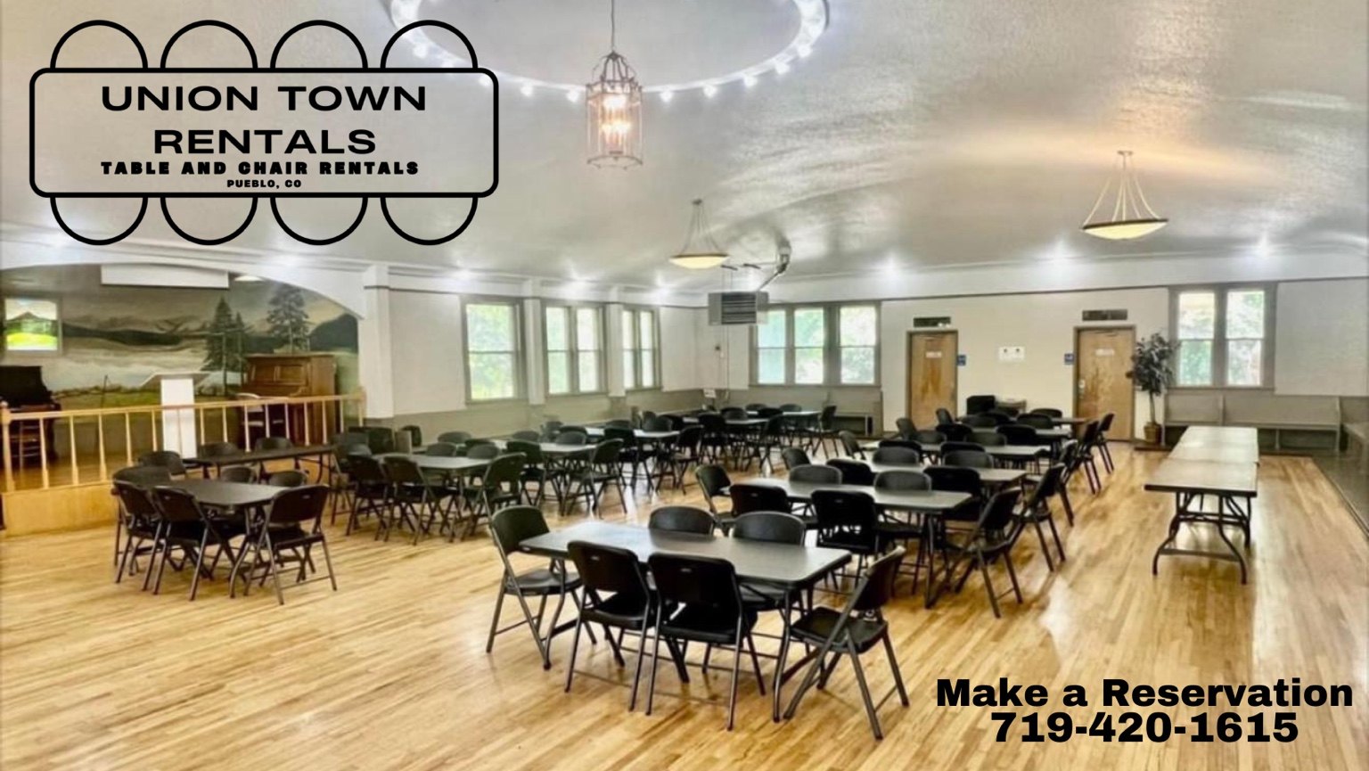 Indoor event setup with tables and chairs